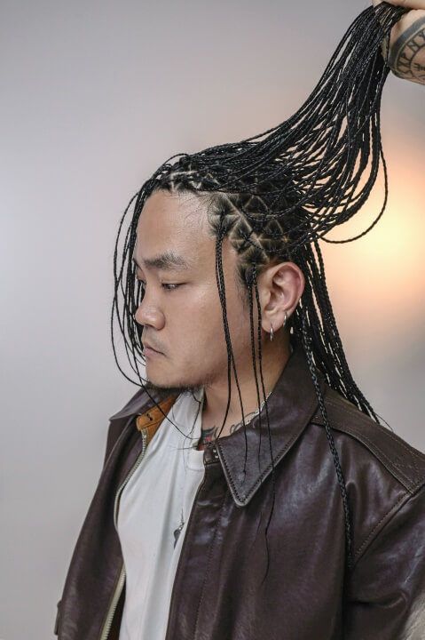 Here is a photo of box braids in a triangular section.