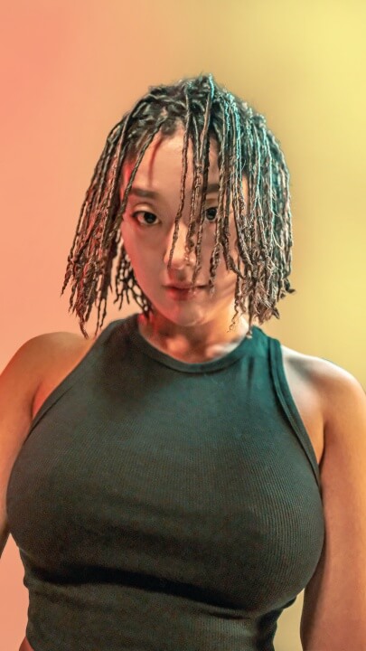 Here is a picture of Dreads Perm for women.