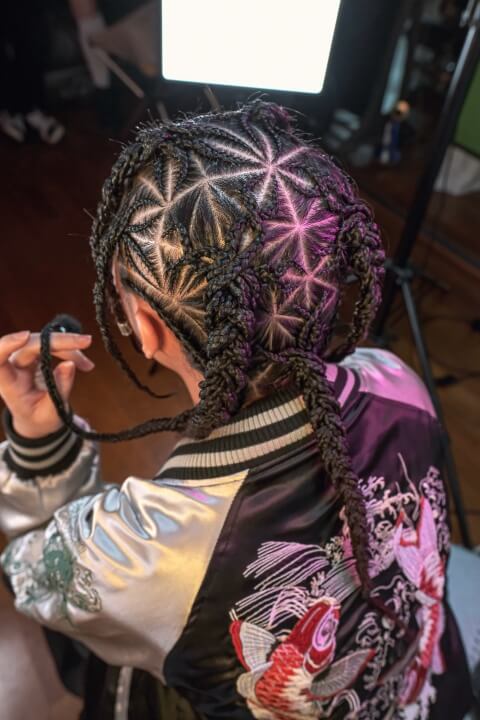 Here is a picture of a women's Art Cornrows hairstyle.